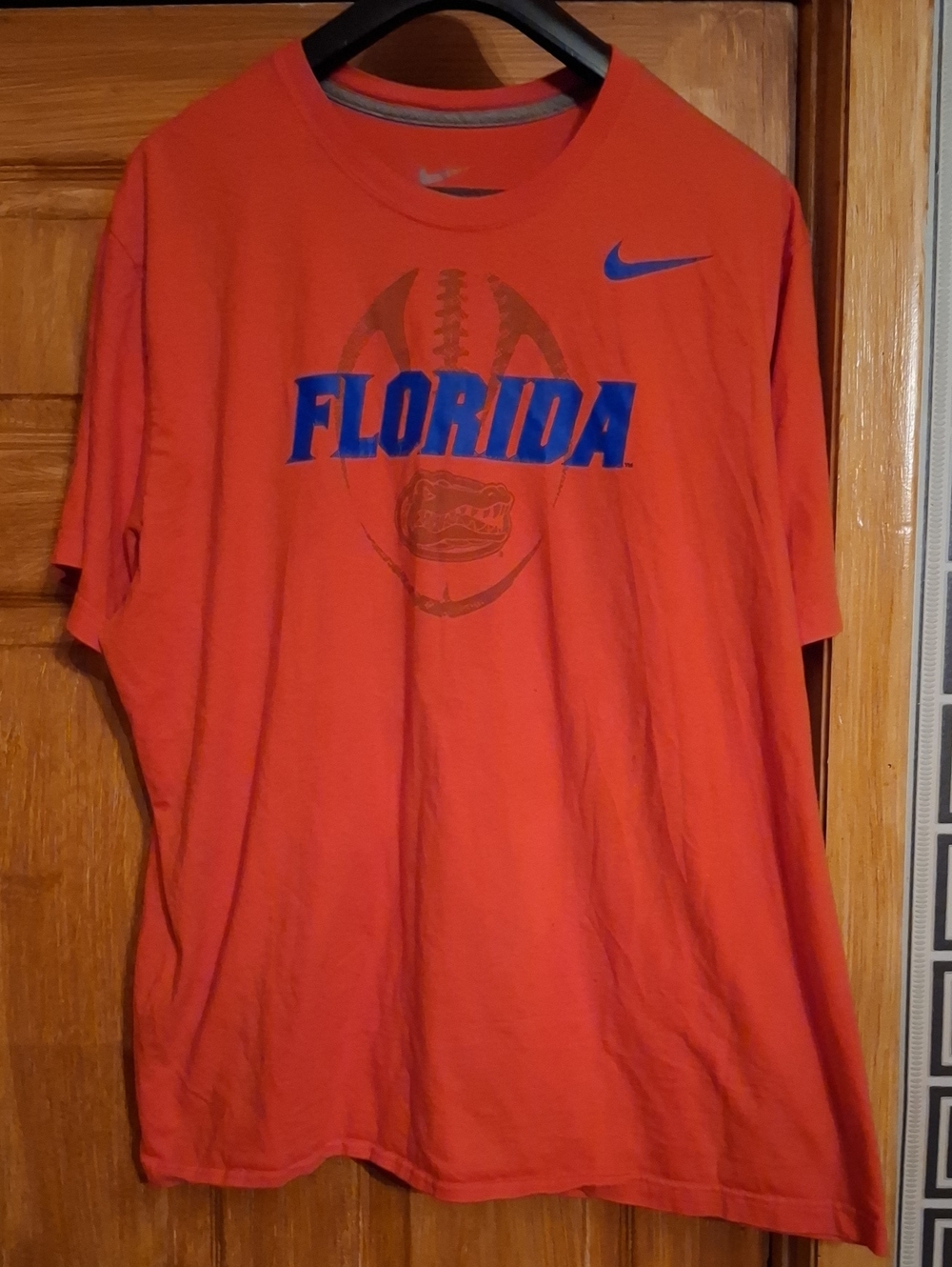 Nike Orange Short-Sleeve Florida Graphic Tee with Blue Logo